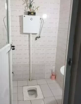 توالت ایرانی همراه با سیفون و روشویی سرویس بهداشتی خانه روستایی در ملاکلا